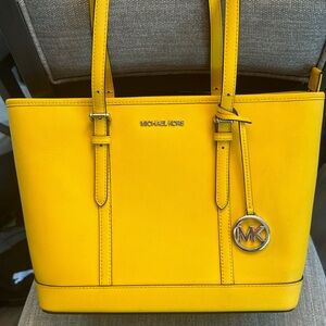 Used yellow mediums sized Michael Kors purse